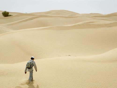 A participant during the desert experiment. On this day the sun was visible and the subject was not blindfolded. He was able to walk in a reasonably straight line