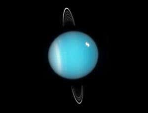 Large moon of Uranus may explain odd tilt