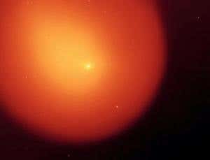 Sun's warmth blows comet's icy heart apart