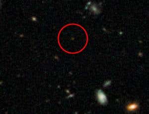 Dim galaxy is most distant object yet found