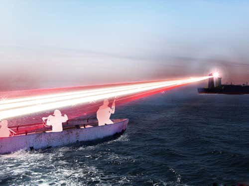 A BAE Systems artist's impression of the dazzling laser in action – the proposed system uses a green laser, however, and is not intended to vaporise suspected pirates