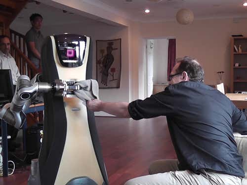 In the Robot House, the Fraunhofer Institute’s purple-eyed CareRobot brings our man a woolly hat. A gentle tug makes the droid release it from its fearsome grippers