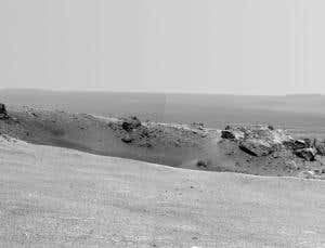 Mars rover reaches rim of vast, ancient crater