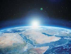 How was Earth's life kindled under a cold sun?