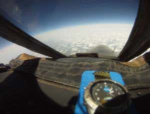 Feathery cirrus clouds have a cold metallic heart