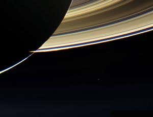 Shiny, happy Earth photobombs Saturn snapshot