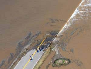 Floods engulf highways and homes in Colorado