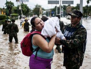 Mexico's people hit by double whammy of tropical storms