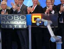 People-safe robot is first non-human to close NASDAQ