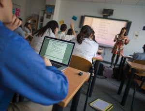 Robotutor marks the homework of a class of thousands