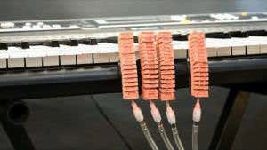 Rubbery robot fingers play piano faster than a human