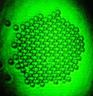 Laser makes ultra-light mirror out of tiny beads