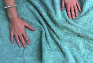 Gravitational waves explained with a towel and apple