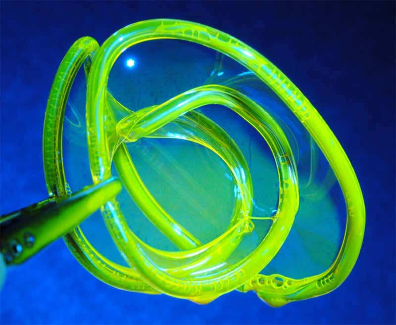 Watch a singularity form in a stretchy soap film