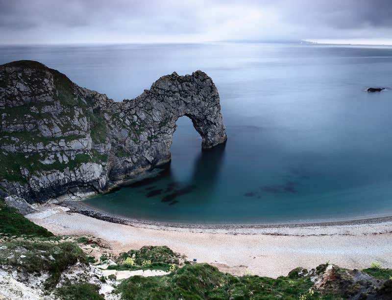 Vast rock arches sculpt themselves out of sand