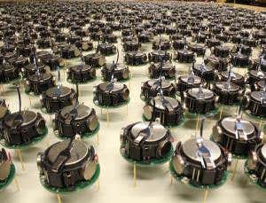 Watch a swarm of 1000 mini-robots assemble into shapes
