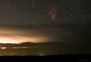 Red sprites and gravity waves dance in a stormy sky