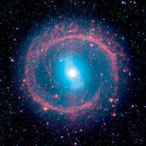 Churning galaxy boasts a fiery halo of baby stars