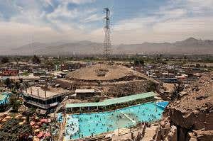 Turquoise pool is an oasis in Lima's arid metropolis