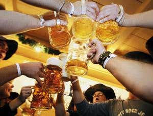 Bubble physics explains beer's own anti-spill mechanism