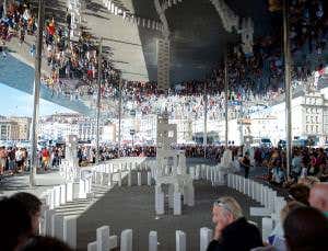 A comedian stands up for sums