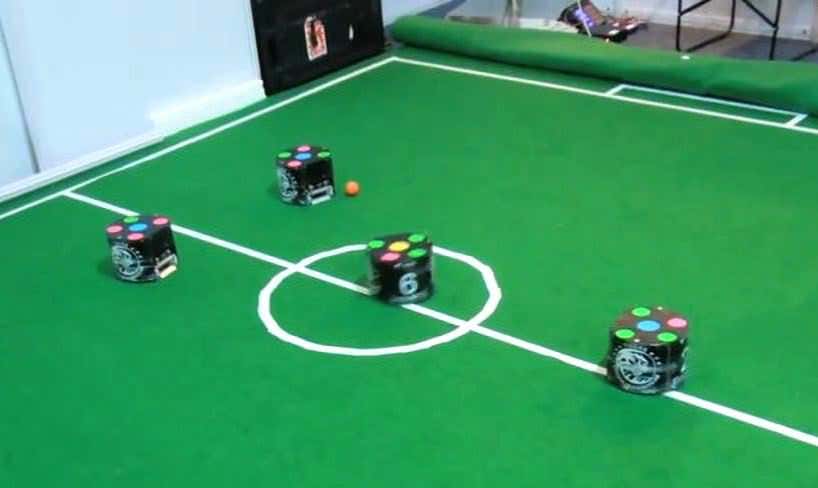 Cubical robots train for world football championships