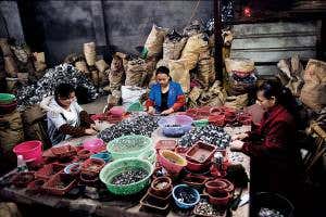 See one of the world's dirtiest jobs: e-waste disposal