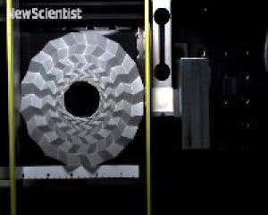 Origami doughnut squashes up to protect what's inside