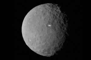 Two mysterious bright spots on dwarf planet Ceres are not alike