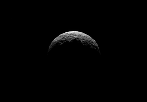 North pole of spinning dwarf planet Ceres glows in the sunlight