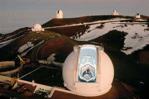 Giant telescope in Hawaii gets go-ahead,  if others shut down