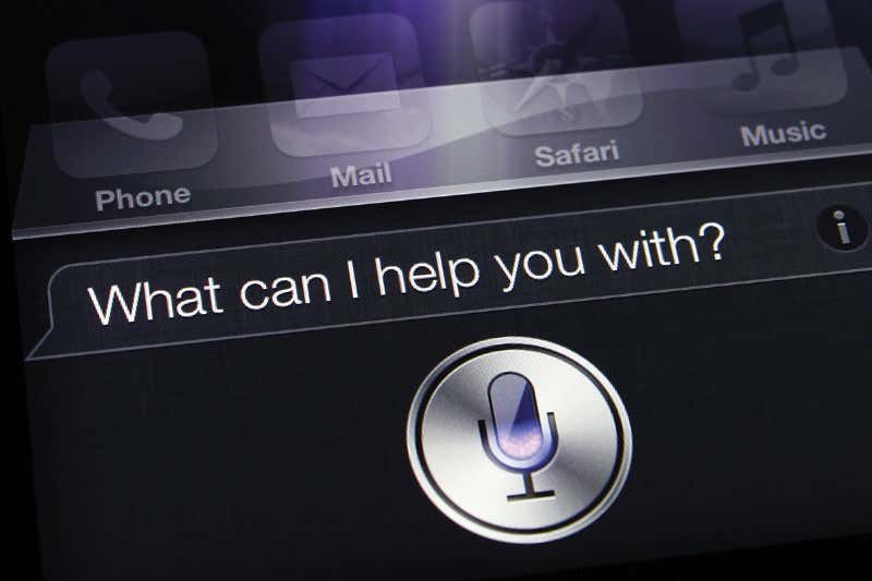 Computer screen with microphone icon and text saying 