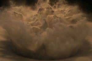 Bursting balloons in a sand box show distinct pattern of craters