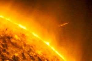 What would happen if a massive comet crashed into the sun?