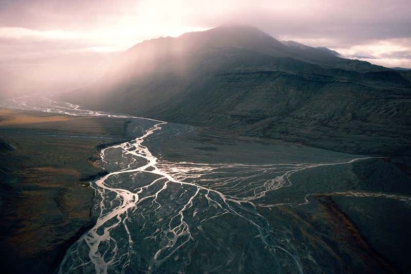 Travel back in time to Earth's mightiest rivers and mountains
