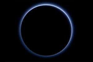 New Horizons shows Pluto sporting blue skies and red water ice