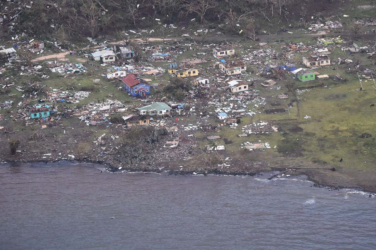 Houses on Fiji flattened by cyclone Winston with debris everywhere
