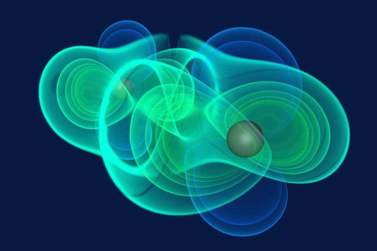 A computer model of the gravitational field around two black holes as they circle each other