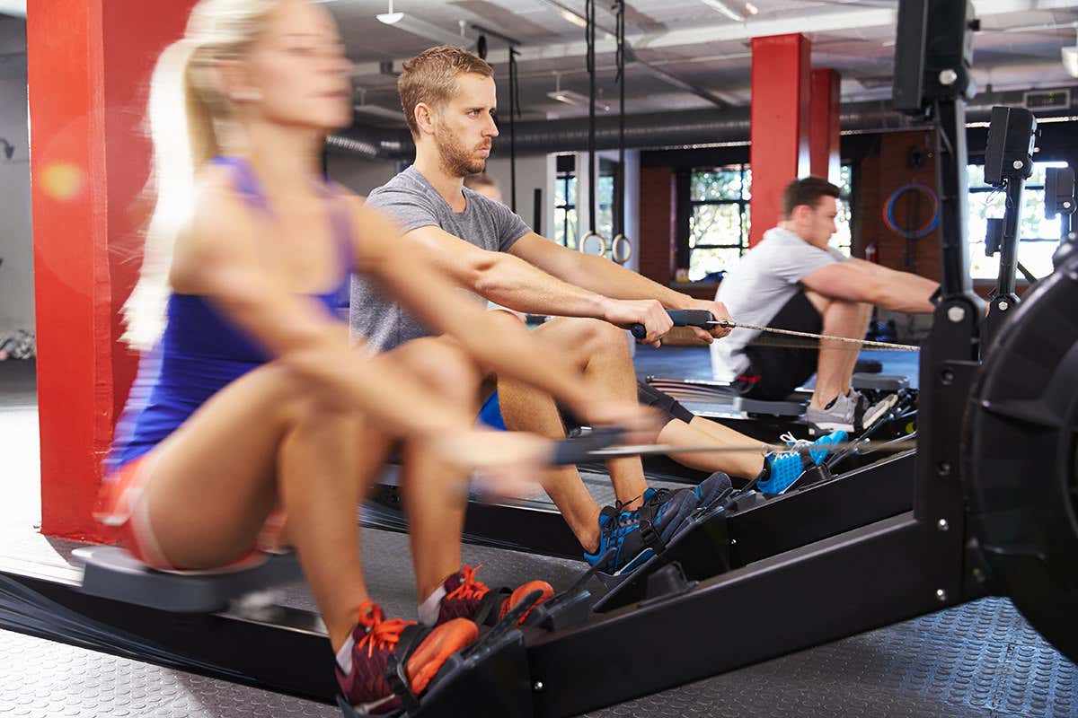 People exercising on rowing machines