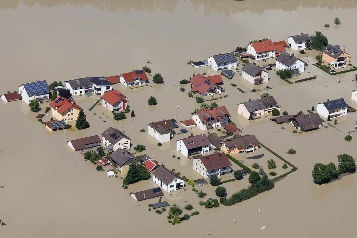 Houses surrounded by flood water from river