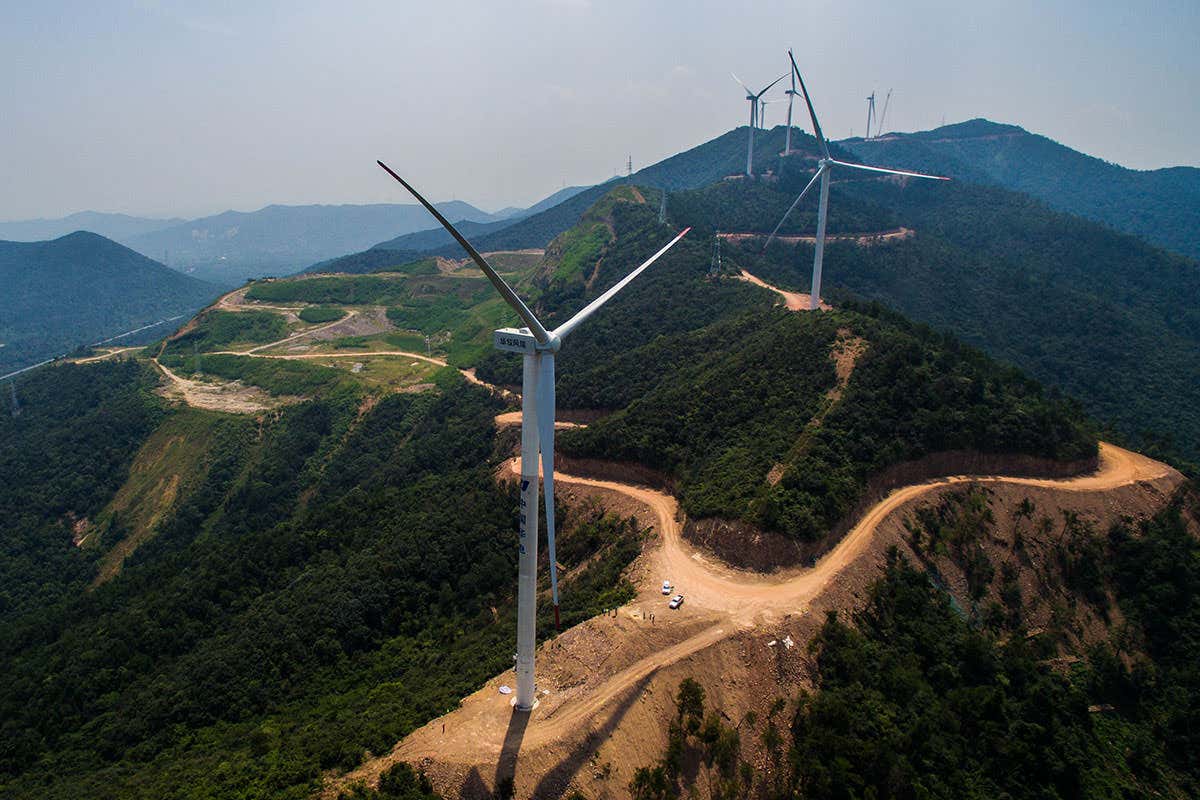 Wind turbines on green hills in China
