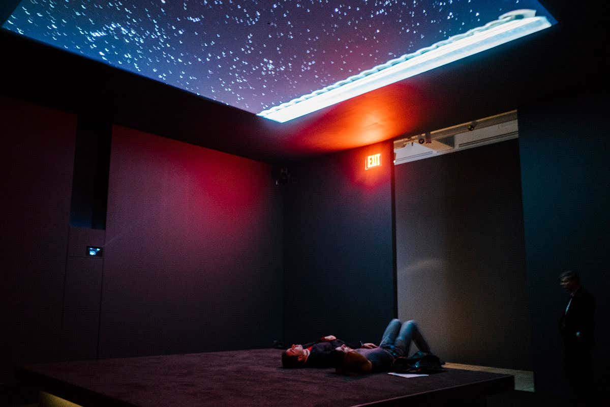 Bed Down Location, showing time-lapse video projections of night skies in Yemen, Somalia and Pakistan