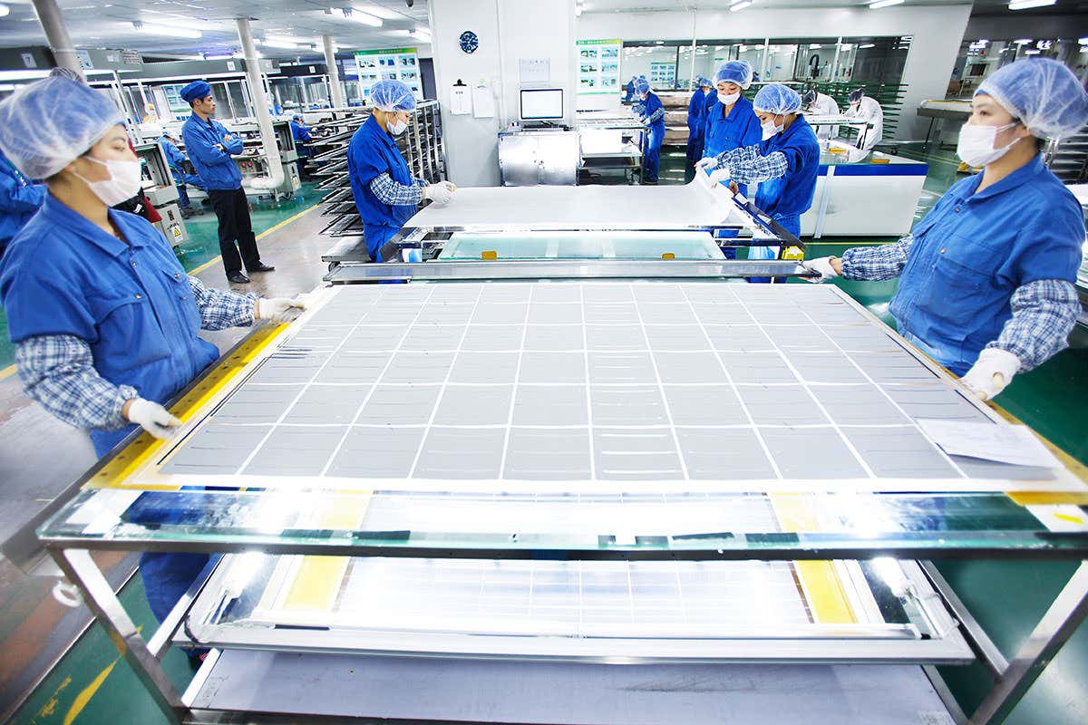 People making solar panels