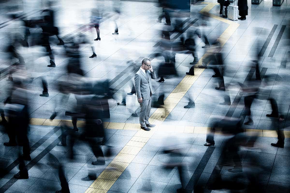 A man in a busy crowd