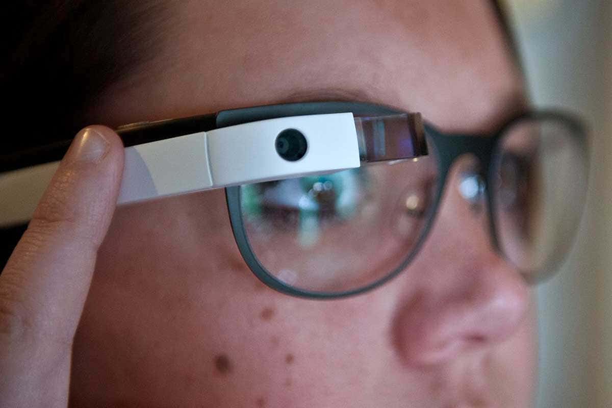 Close-up of a woman wearing smart glasses