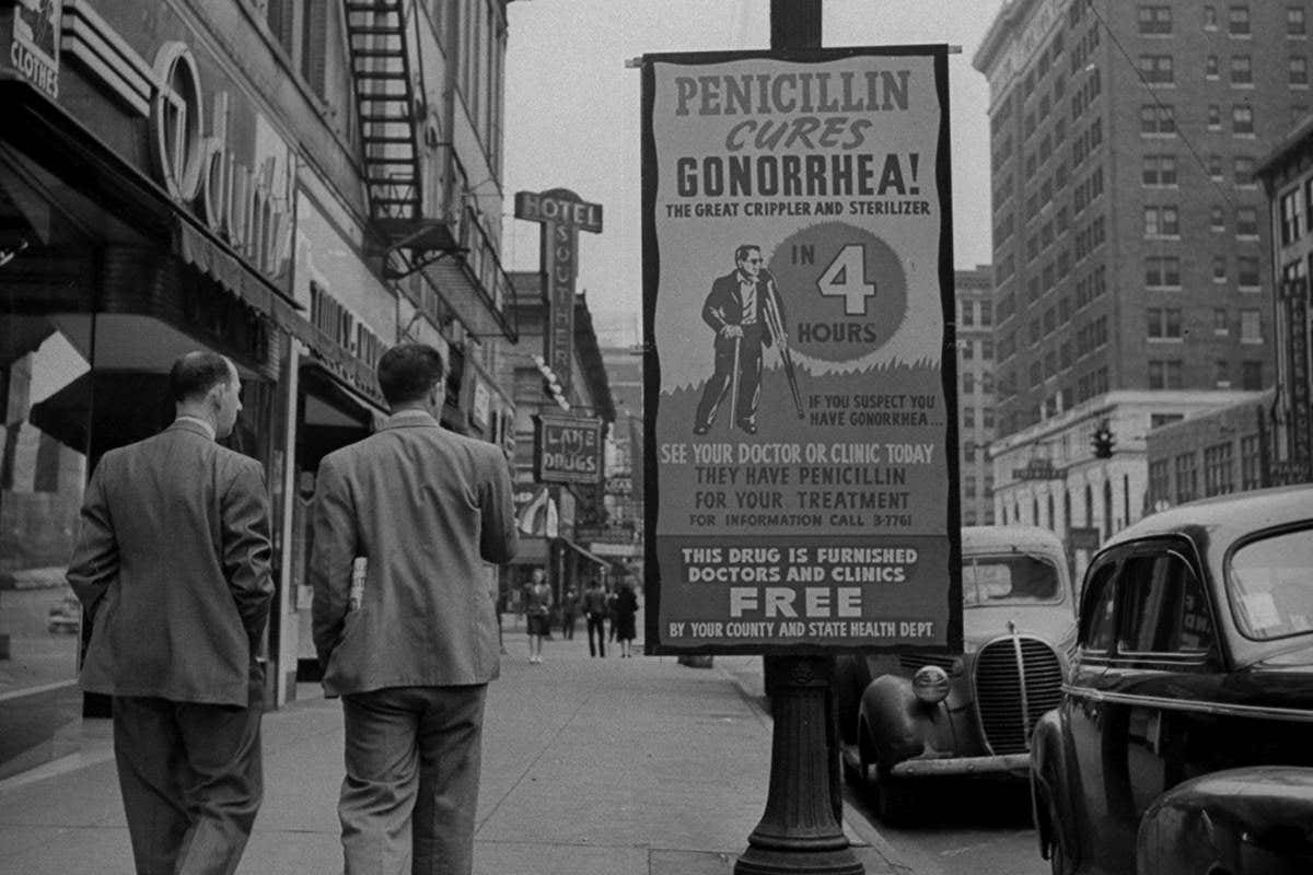 An old sign advertising pencillin as treatment for gonorrhea
