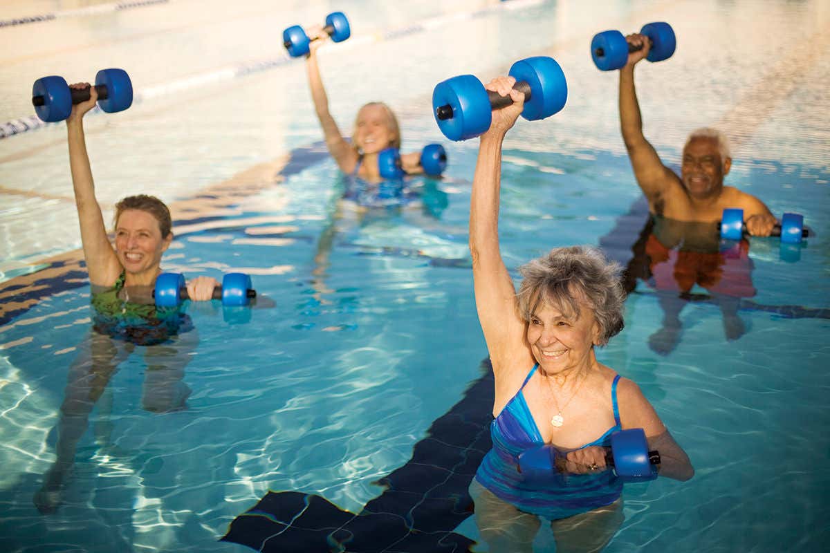 Aqua aerobics class of older people