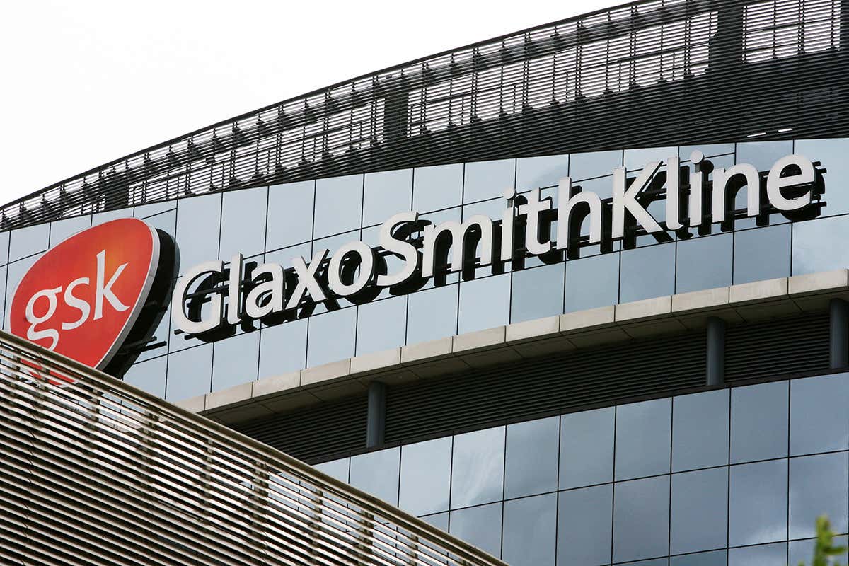 The front of GSK's headquarters showing its logo
