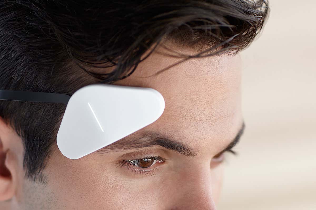 Closeup of a man wearing the Thync neurostimulating device