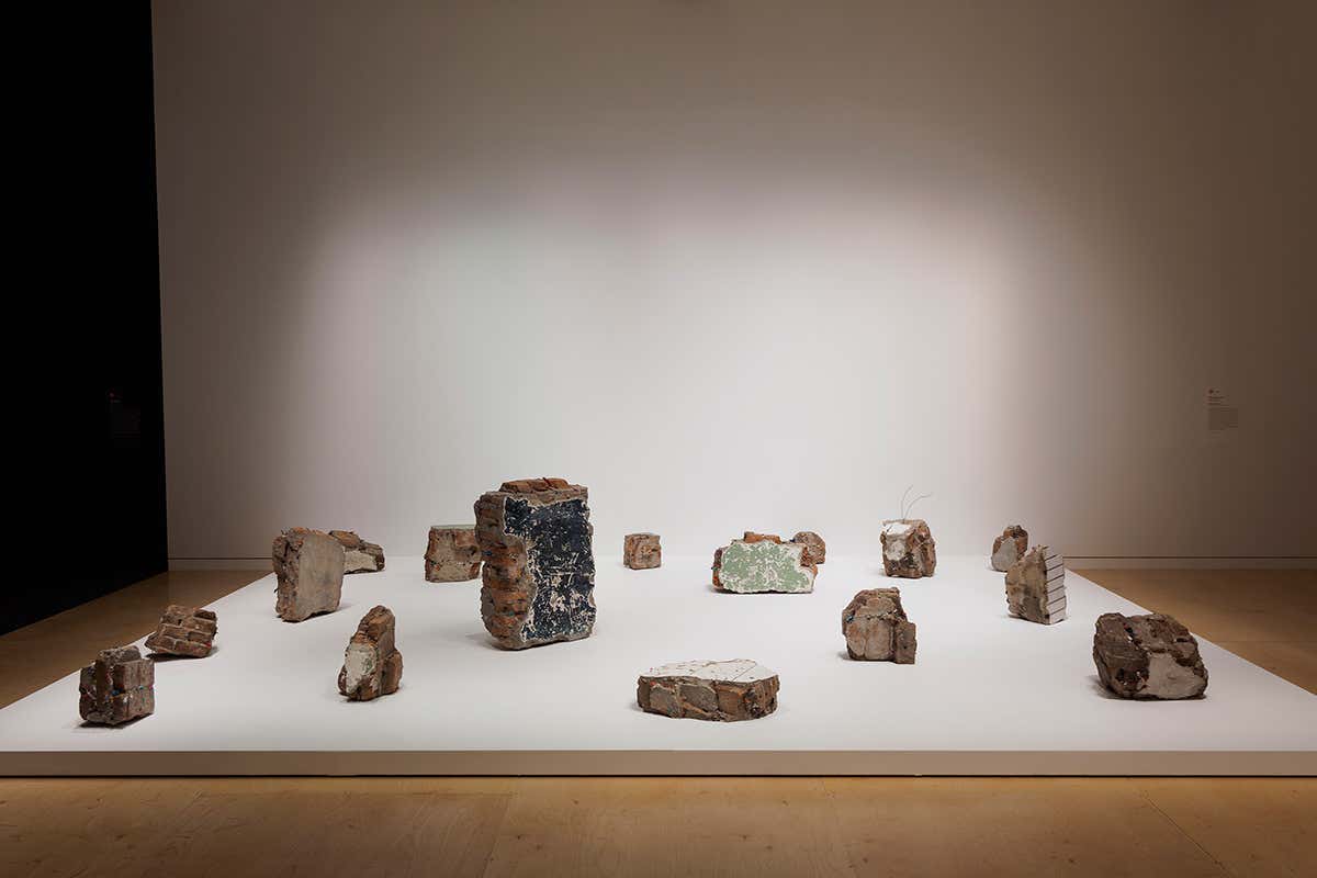 Temperature, by Yin Xiuzhen, comprises rubble from demolished homes, with scraps of the evicted residents clothing still attached